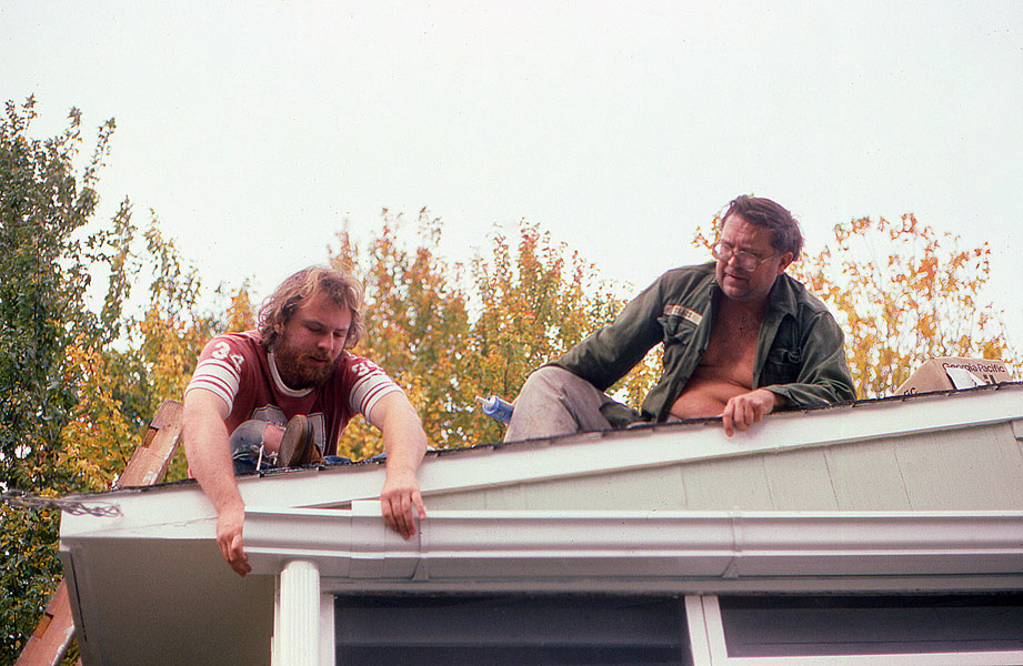 Dave and Dad work on the gutters